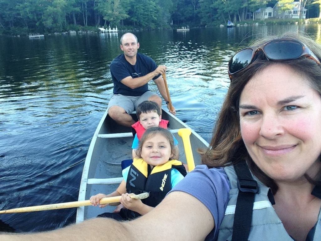 A family on a kayak trip